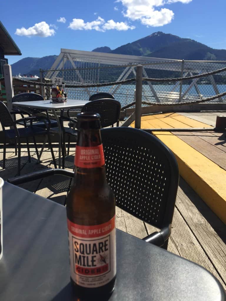 bottle of beer sitting on a table