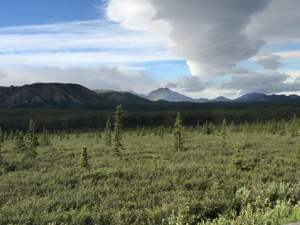 View of mountains with a small rainbow