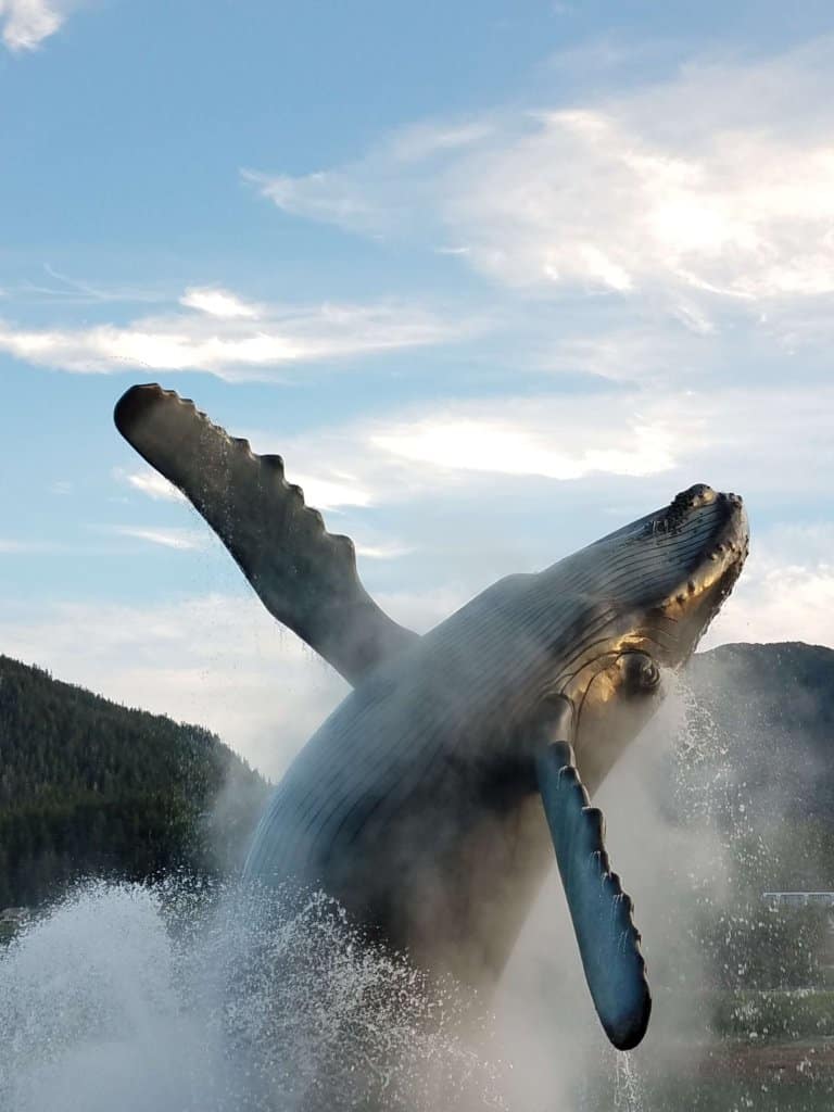 statue of whale breaching