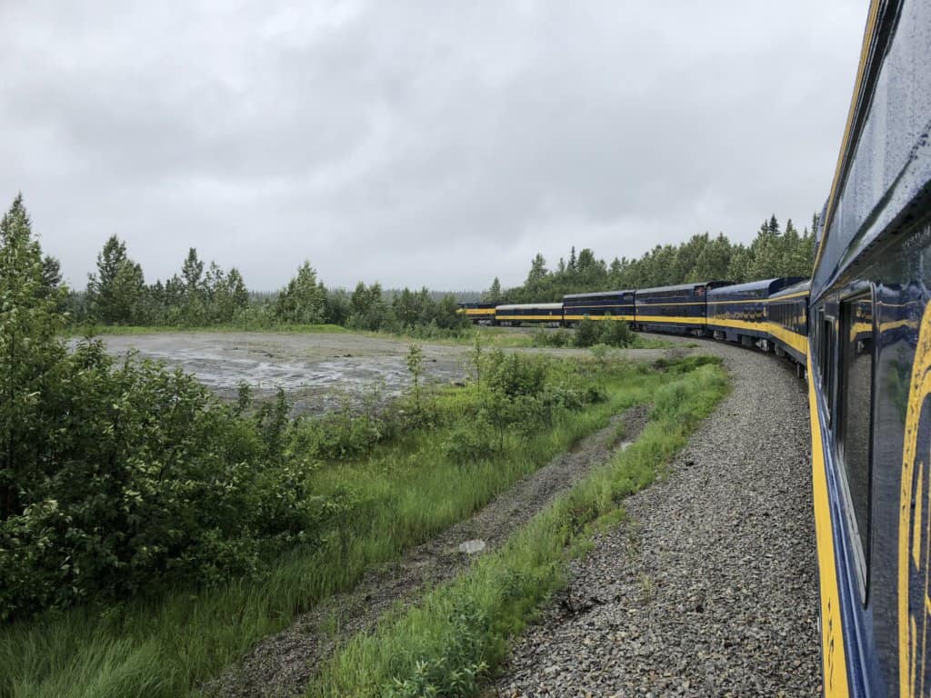 Train curving around a bend in the track