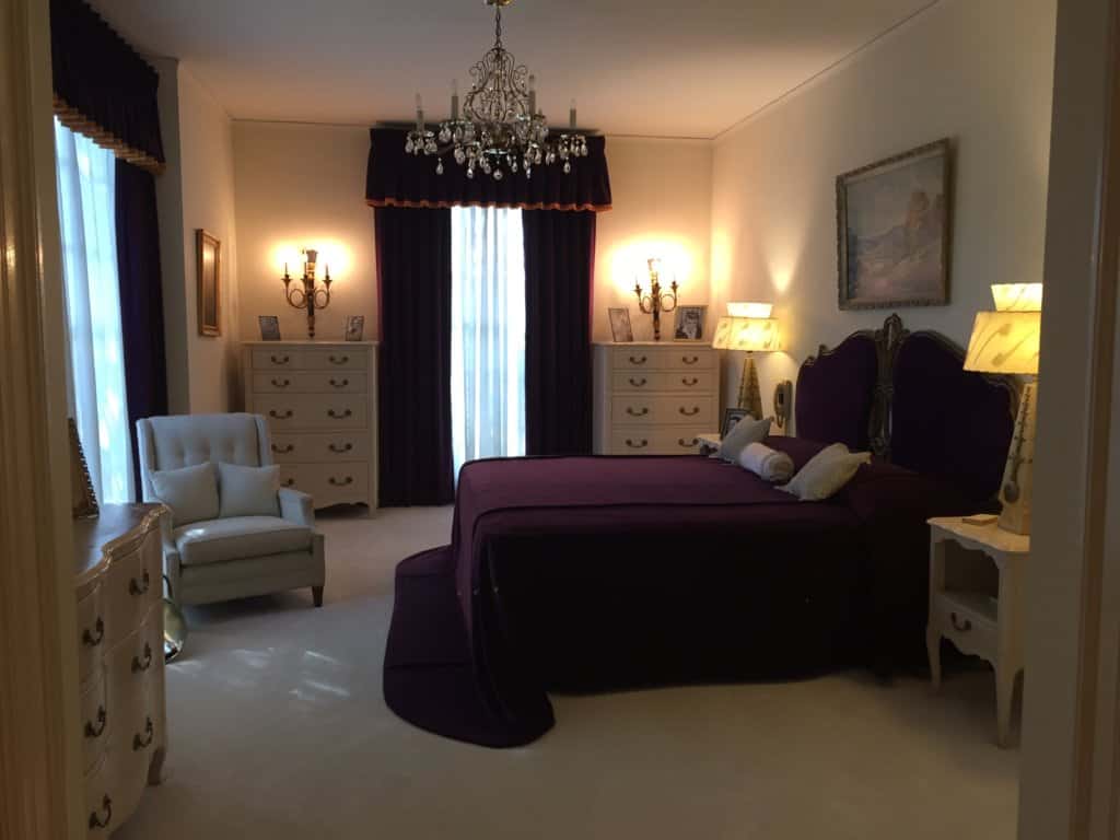 bedroom with burgundy comforter