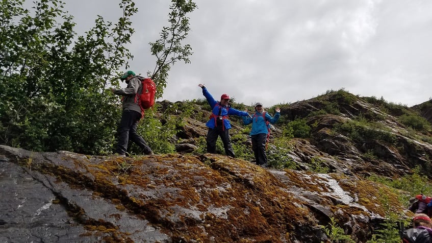 Celebrating at the top of the rock scramble