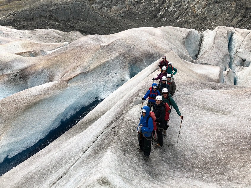 Glacier walk on top of a blue creavasse