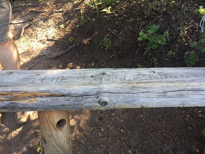 Bench at Talkeetna Lakes with Life is Good in Talkeetna