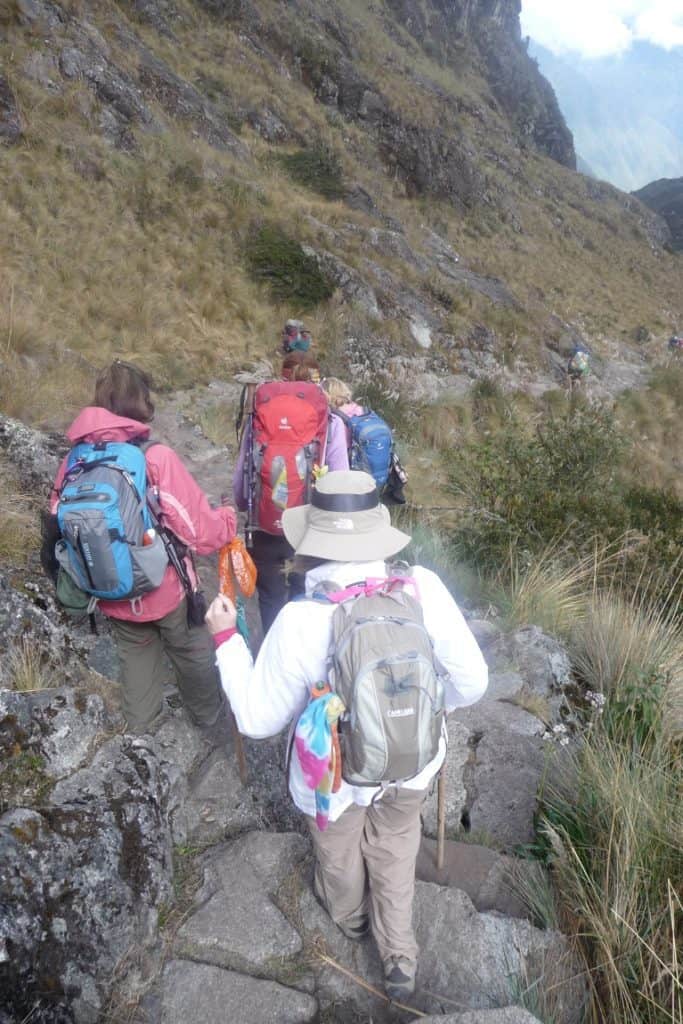 Hiking down steps on the Inca Trail to Machu Picchu